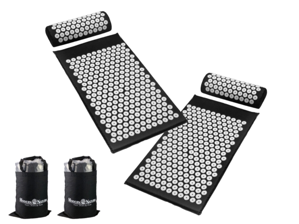 Set d'acupression Shizuka pack double avec picots pyramidaux blancs sur tapis noirs