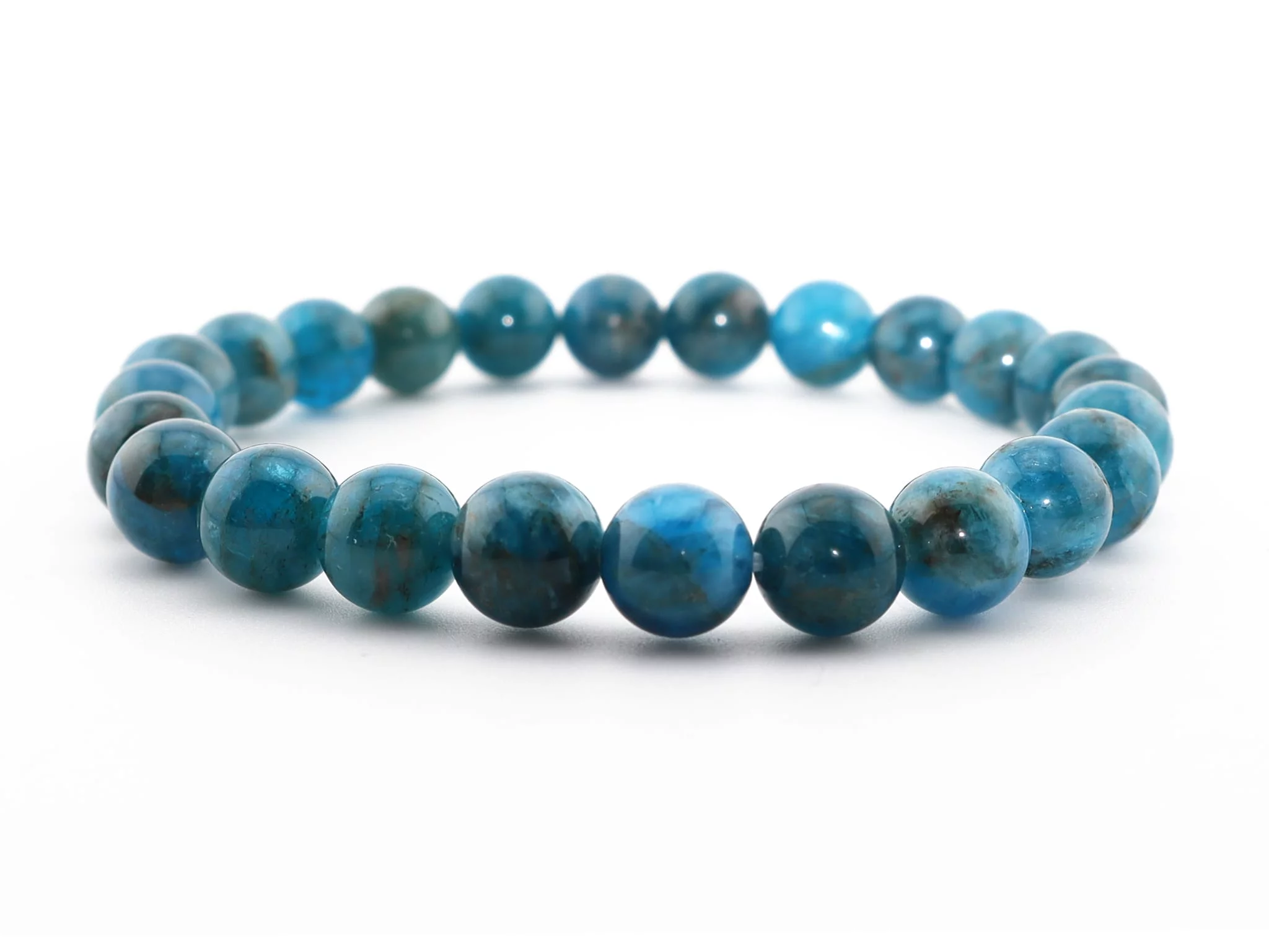 Apatite gemstone bracelet with polished blue-green beads in a close-up front view on a white background