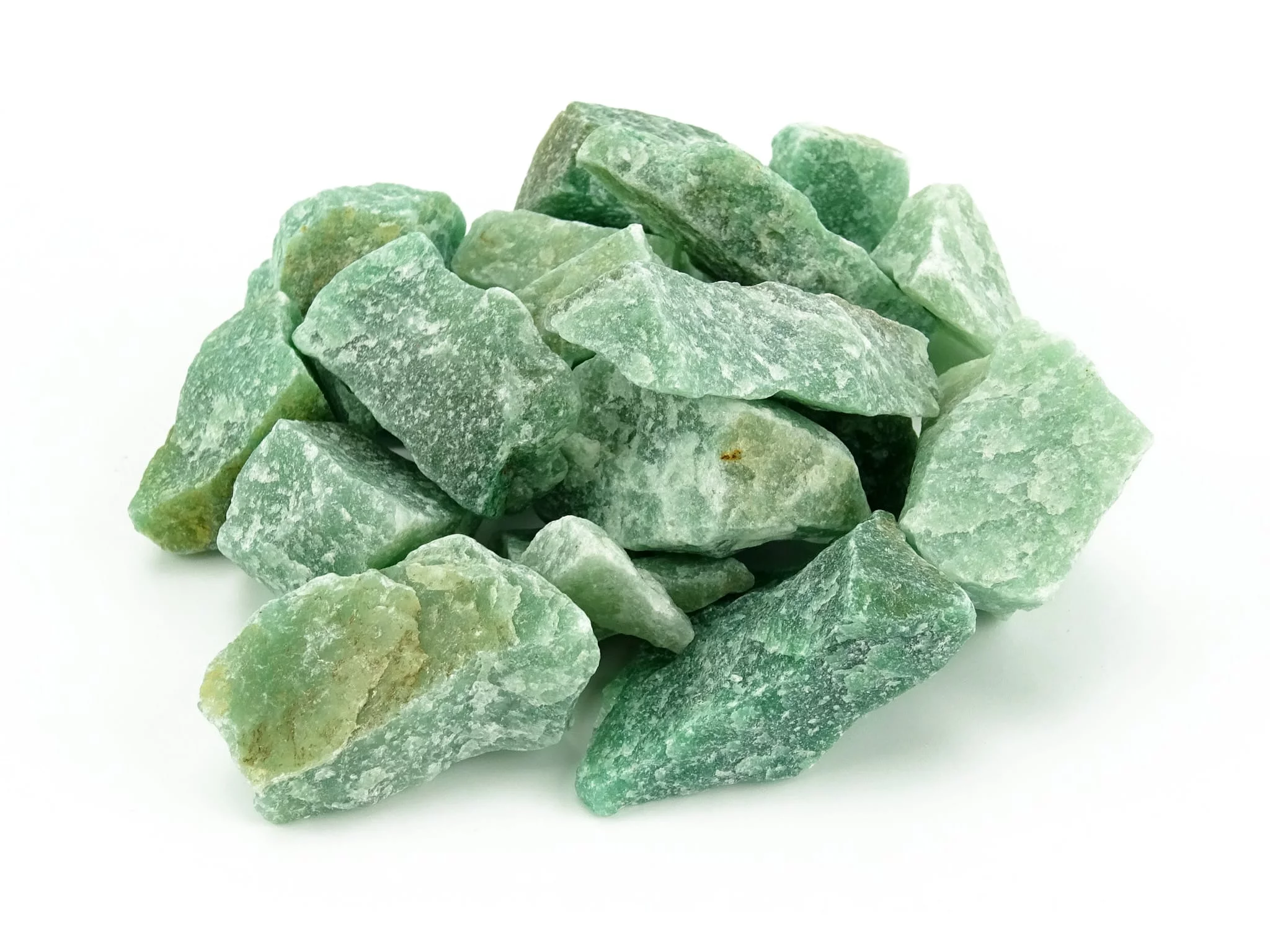 Aventurine water stones as green raw stones in an elevated view on a white background