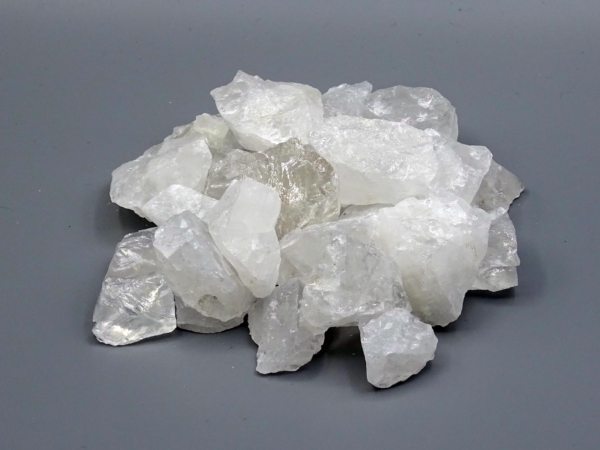Top view of rock crystal water stones with transparent and whitish raw stones