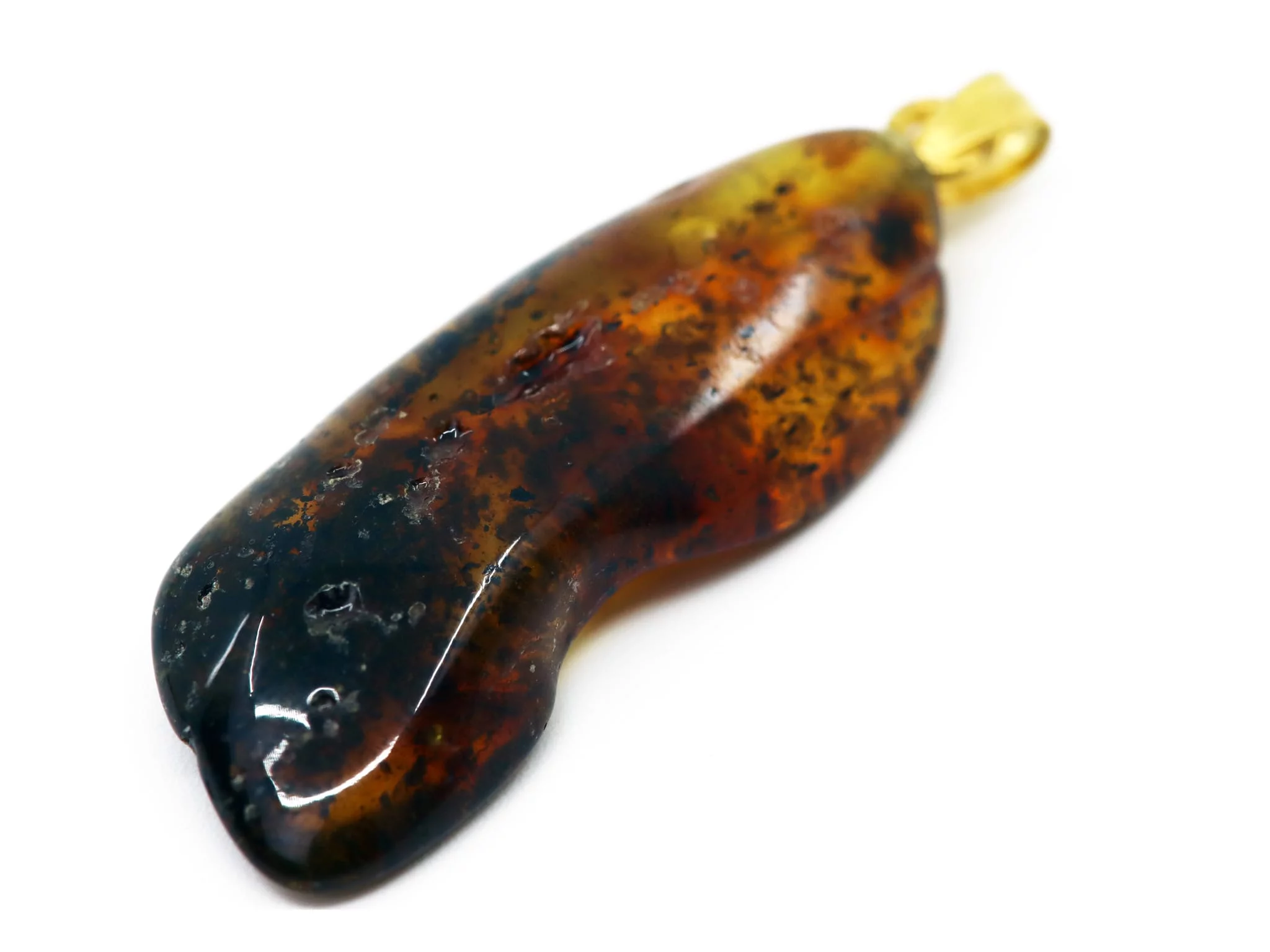 Amber pendant in a dark brown-black color variation with a gold-colored loop