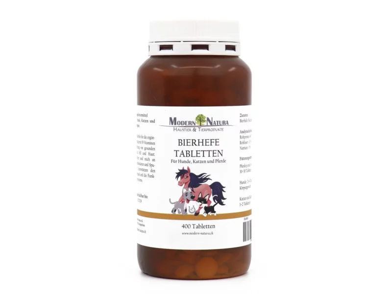 Brewer's yeast tablets in a brown plastic jar with a white screw cap and animal motif on the label