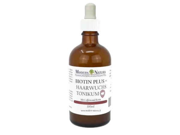 Tonico per la crescita dei capelli Biotin Plus in flacone di vetro marrone con pipetta bianca su sfondo bianco