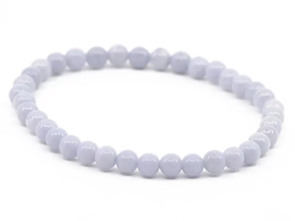 Chalcedony gemstone bracelet with light blue polished beads in an oval overall view