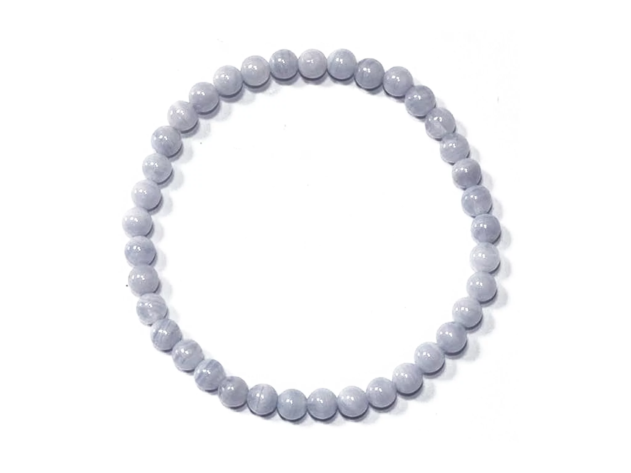 Chalcedony gemstone bracelet from above with evenly arranged light blue beads