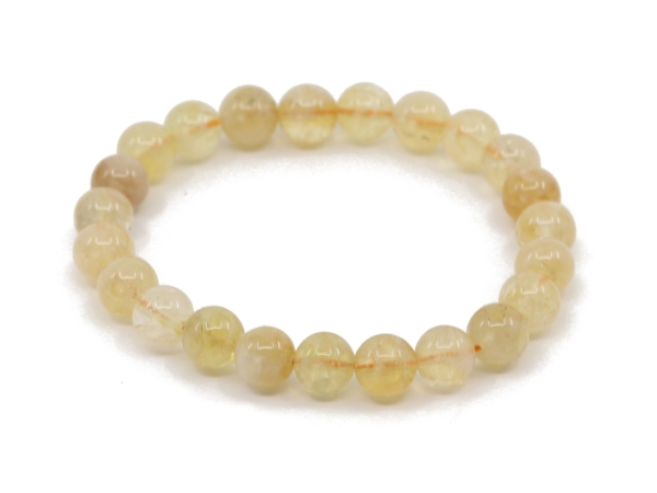 Bracelet en pierre fine citrine en vue de dessus avec perles rondes en pierre naturelle jaunâtre
