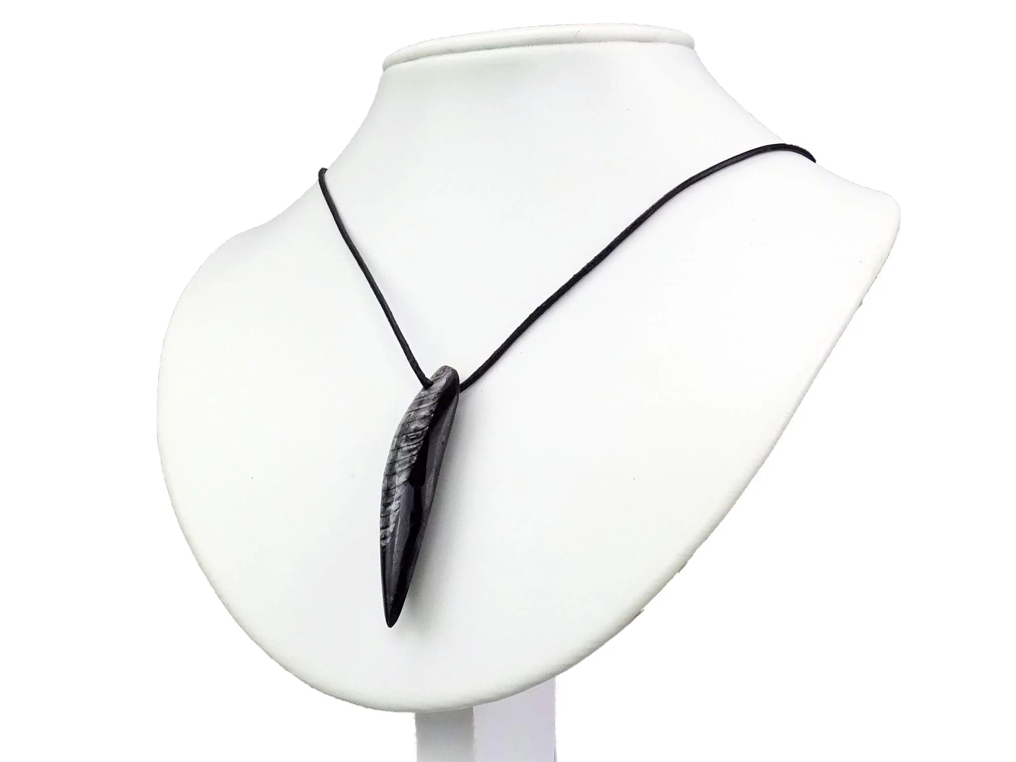 Orthoceras pendant shown worn on a black necklace on a white jewelry bust