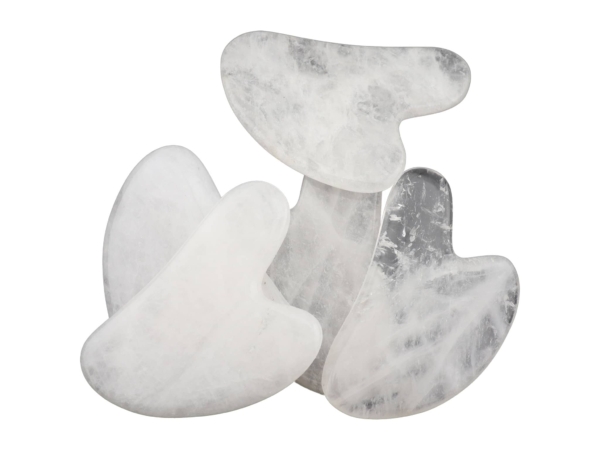 Clear quartz Gua Sha massage stones in different natural transparencies