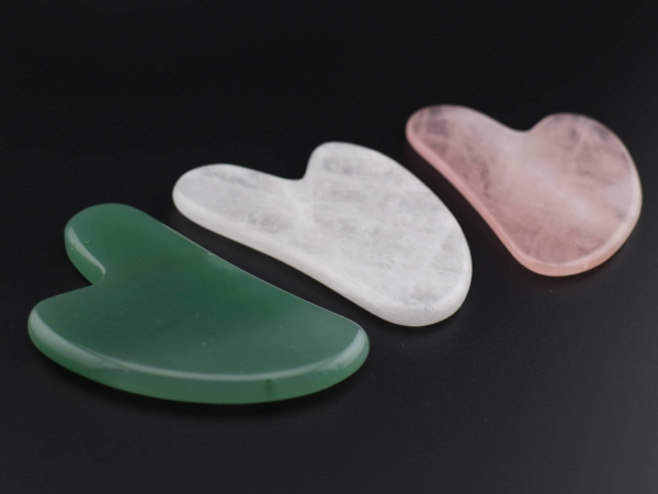 Set de pierres de massage Gua Sha comme assemblage de pierres de massage naturelles