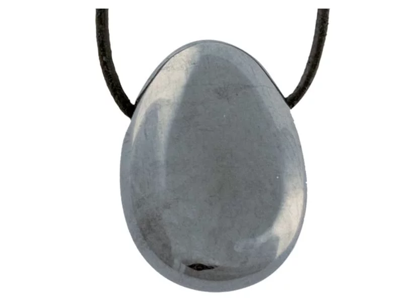 Hematite gemstone pendant as a shiny gray-black donut stone on a black cord