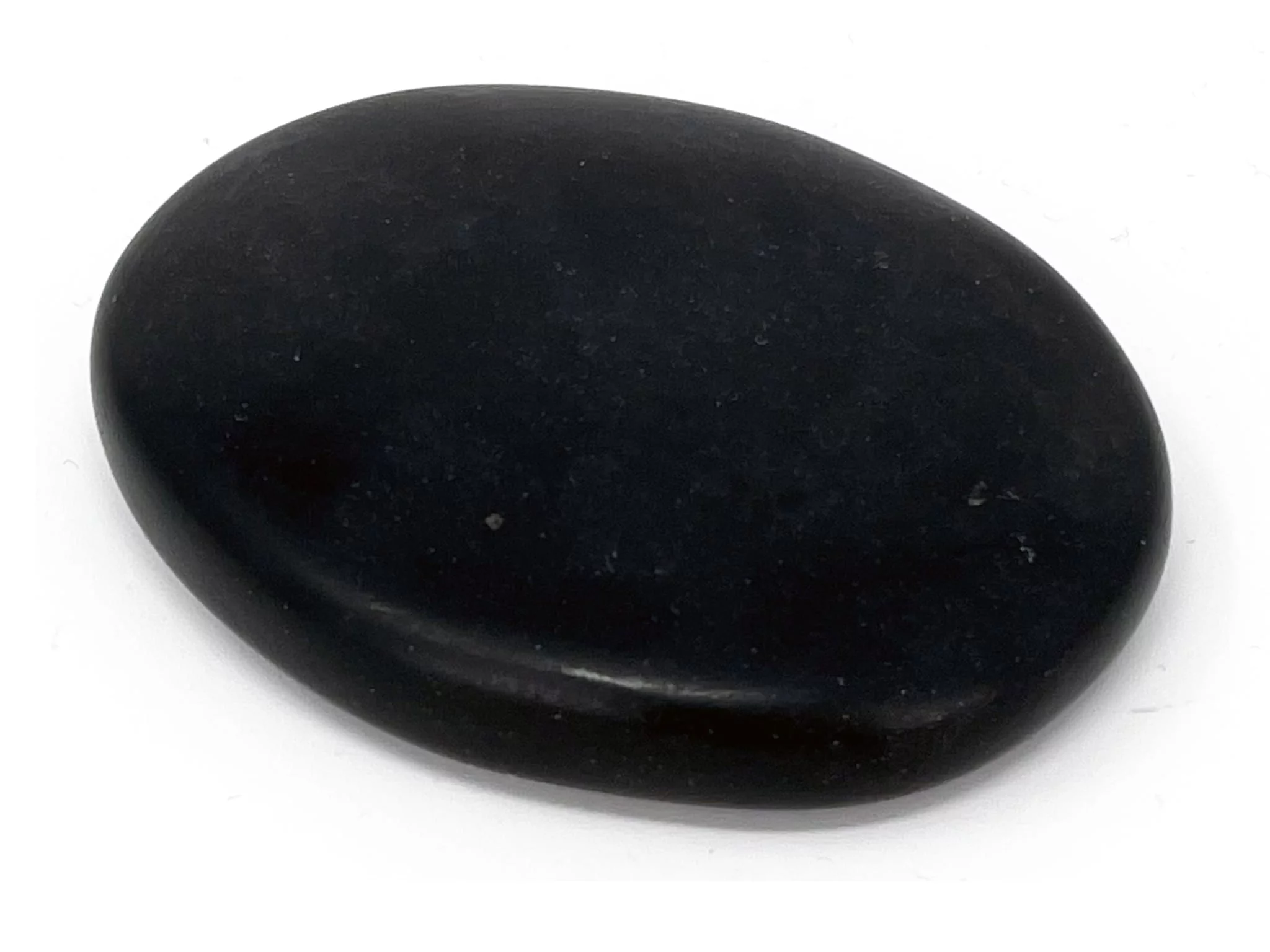 Basalt Hot Stone massage stone in black, smoothly polished oval shape on a white background