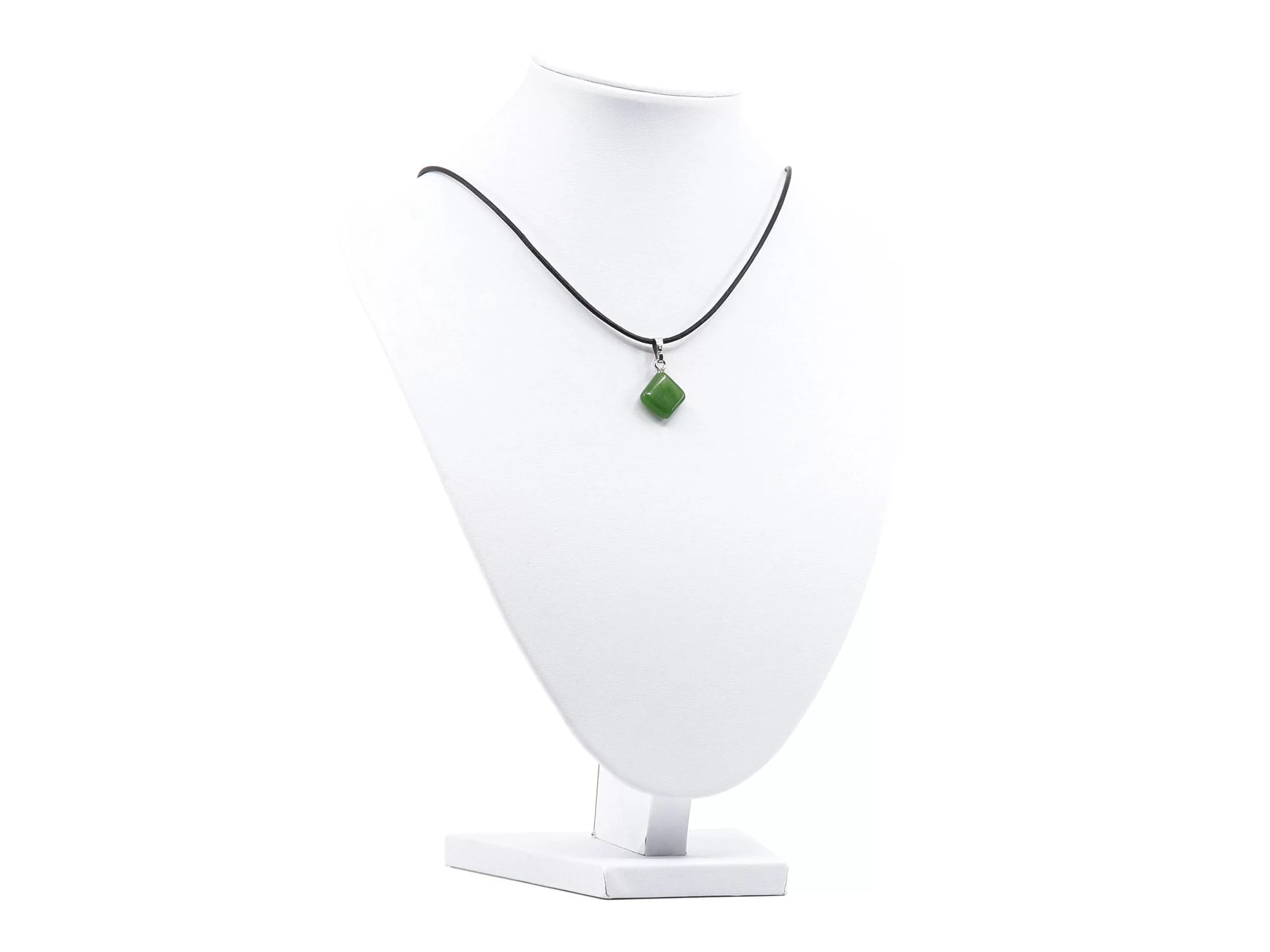 Jade nephrite gemstone pendant as a full view on a white jewelry bust with a black cord
