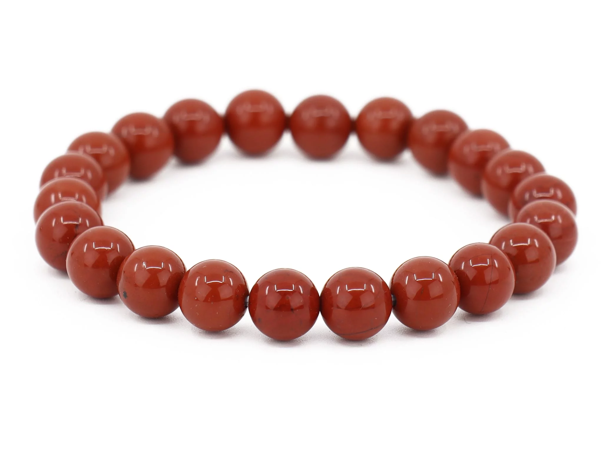 Red Jasper gemstone bracelet with polished beads in close-up front view