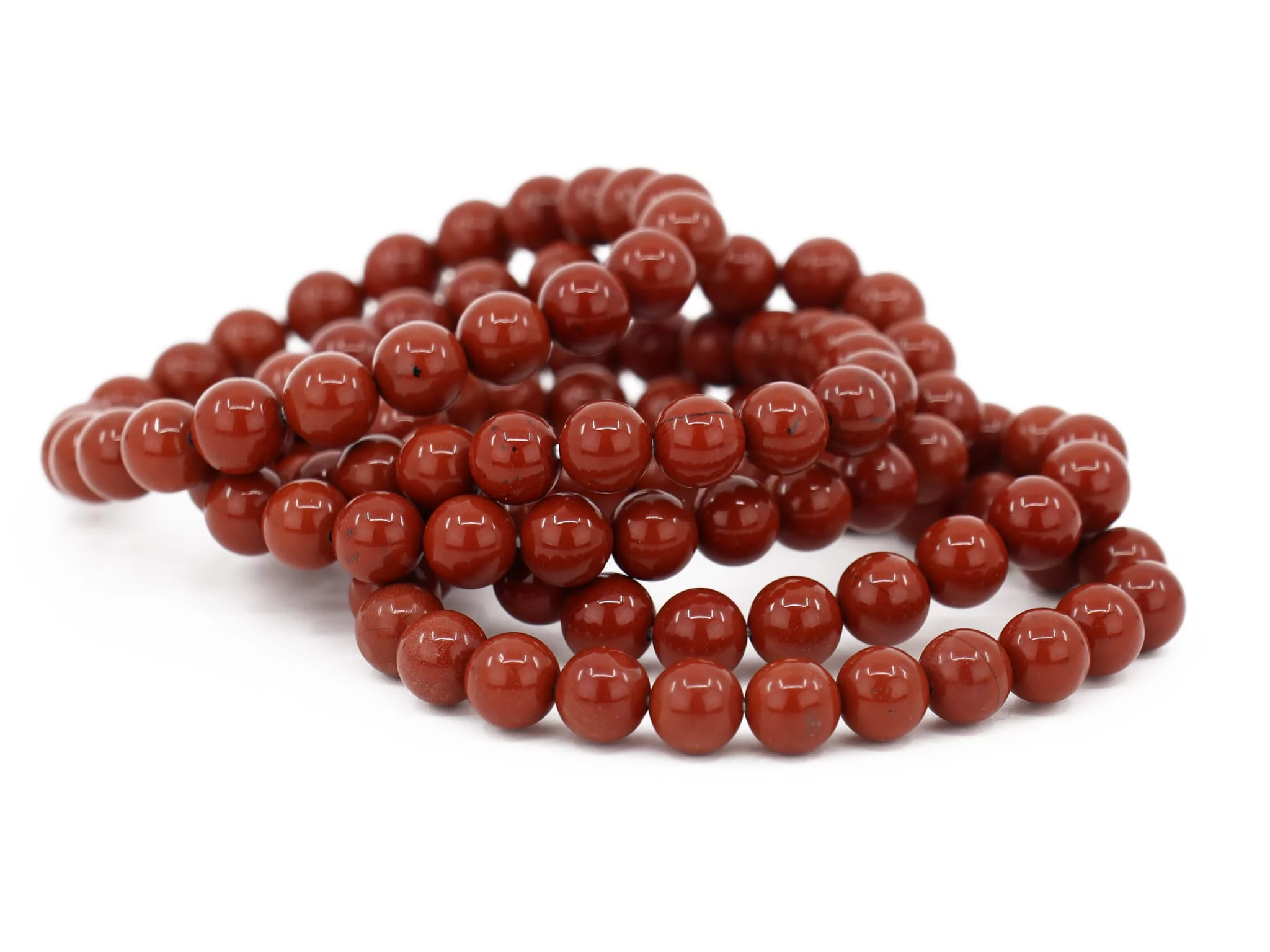 Red Jasper gemstone bracelets with polished beads as a stacked product view
