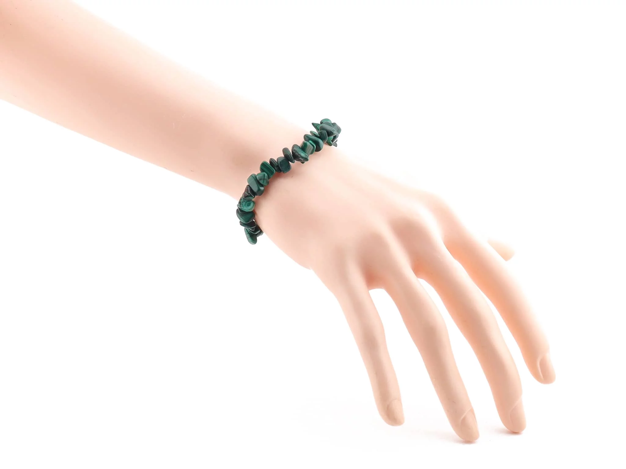 Malachite chip gemstone bracelet on the side of the wrist with green grained chips