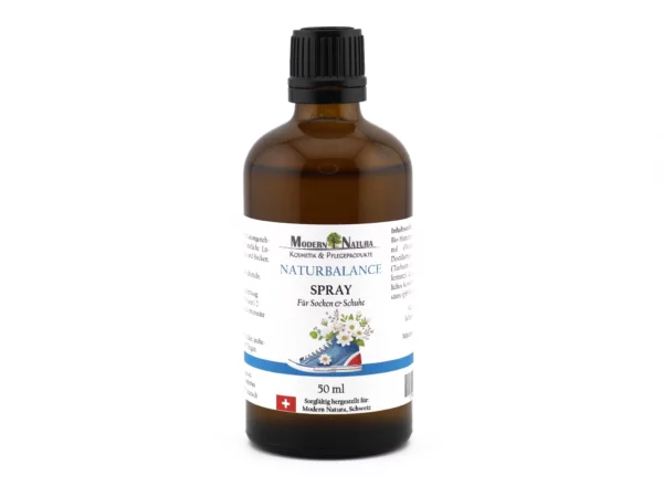 NaturBalance shoe and sock spray in an amber glass bottle with a black spray cap in front of a white background