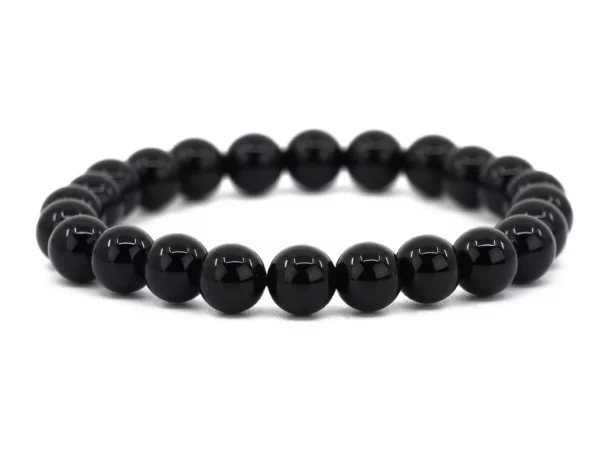Bracciale in onice con sfere nere lucide in vista frontale completa su sfondo bianco