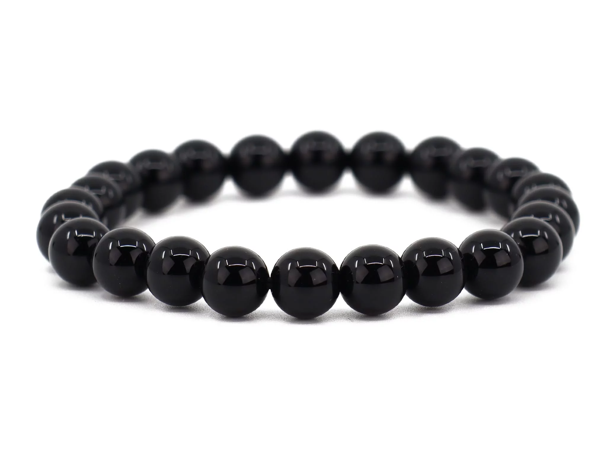 Bracciale in onice con sfere nere lucide in vista frontale completa su sfondo bianco