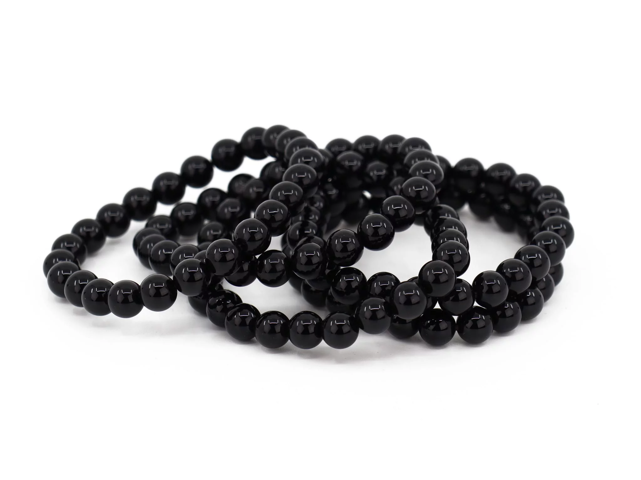 Bracciale in onice con diversi bracciali intrecciati e sfere nere lucide