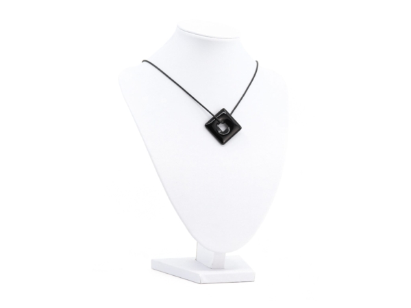 Onyx square-donut pendant as a necklace on a white jewelry bust