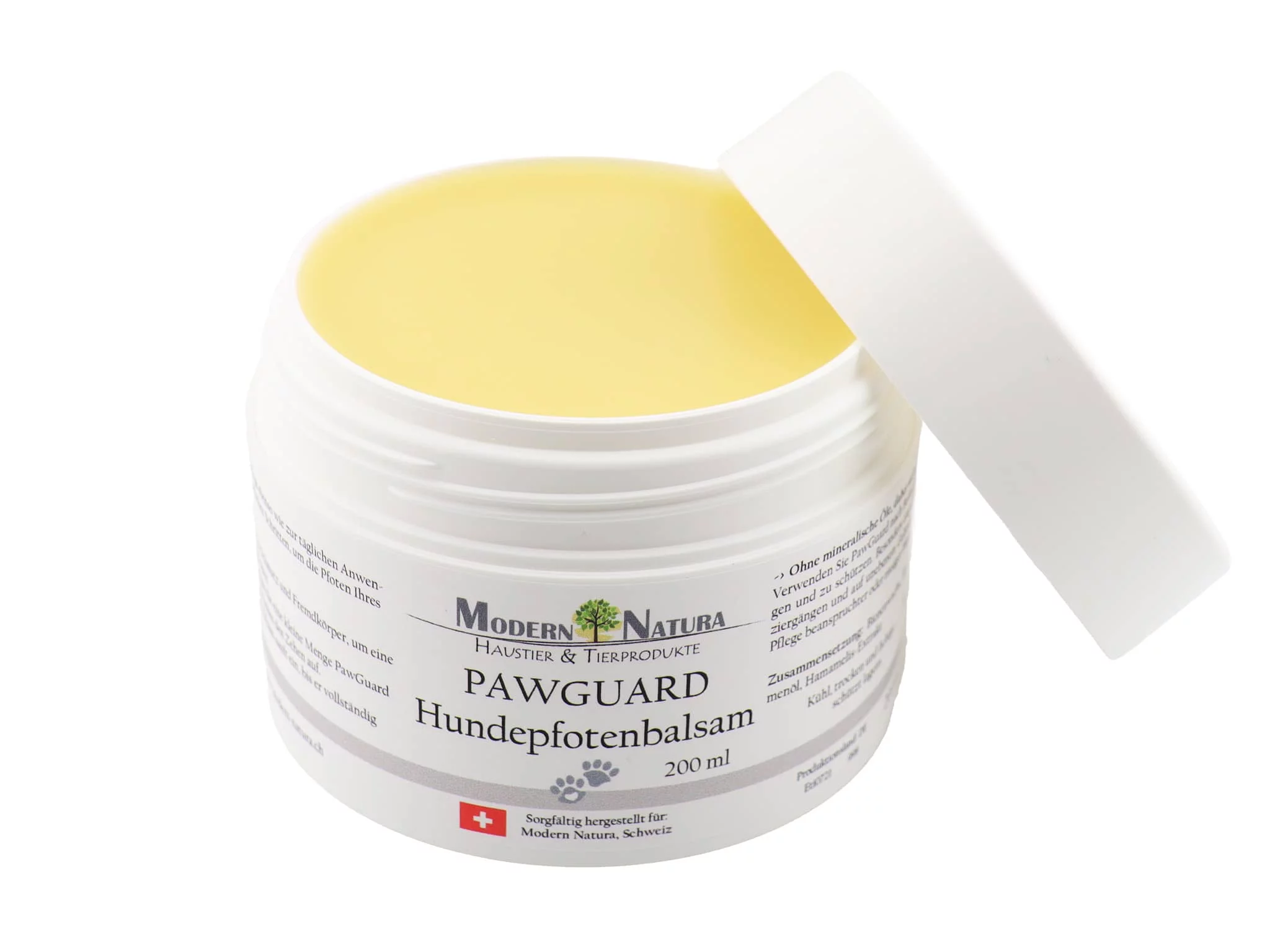 PawGuard Dog Paw Balm in opened white jar with yellow balm and lid