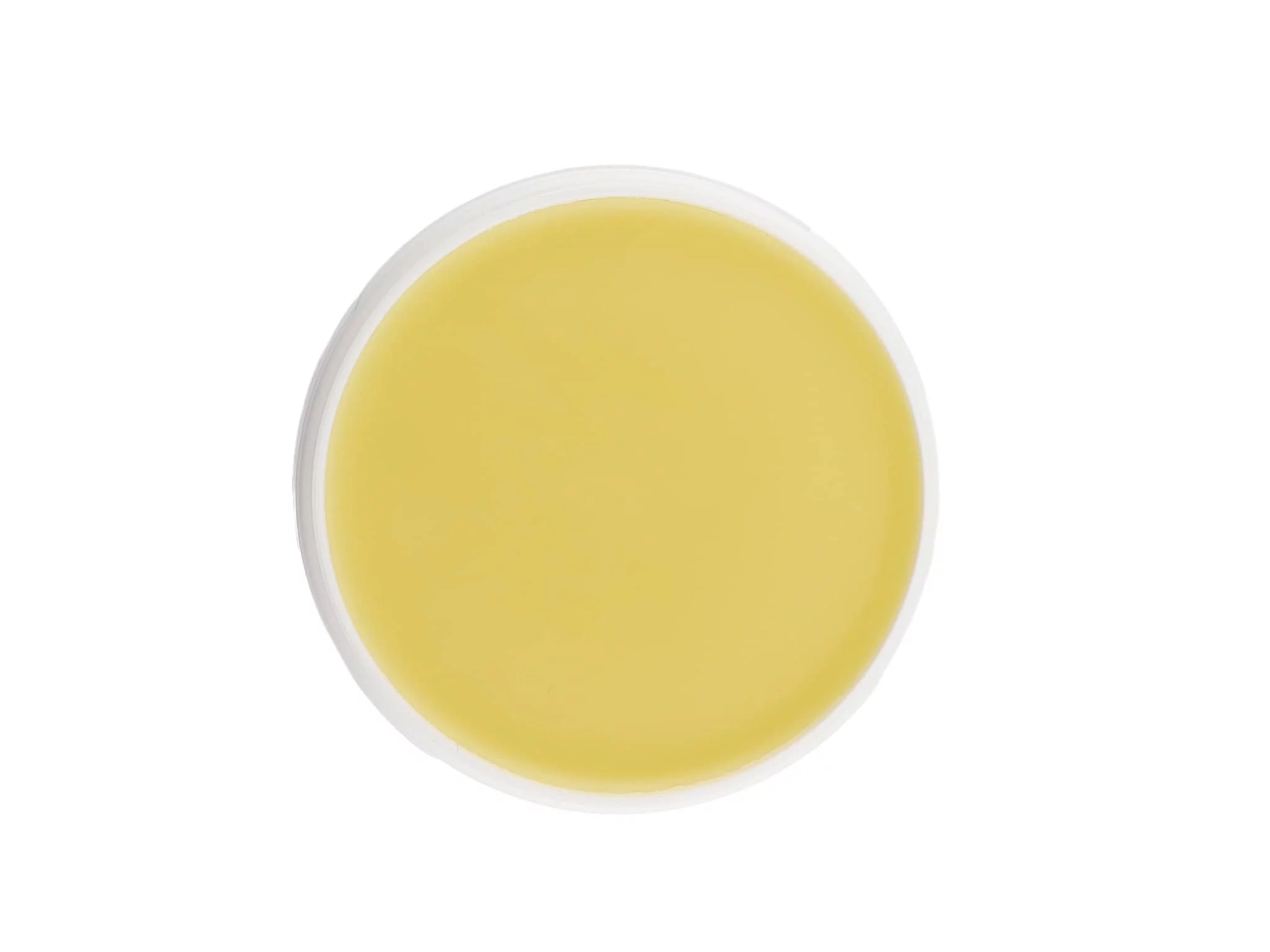 PawGuard Dog Paw Balm as smooth yellow balm surface in the opened jar