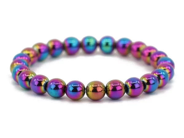 Rainbow hematite gemstone bracelet with iridescent beads in an oval overall view on a white background