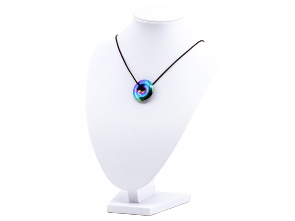 Rainbow hematite donut pendant as wearing view on dark necklace on white jewelry stand