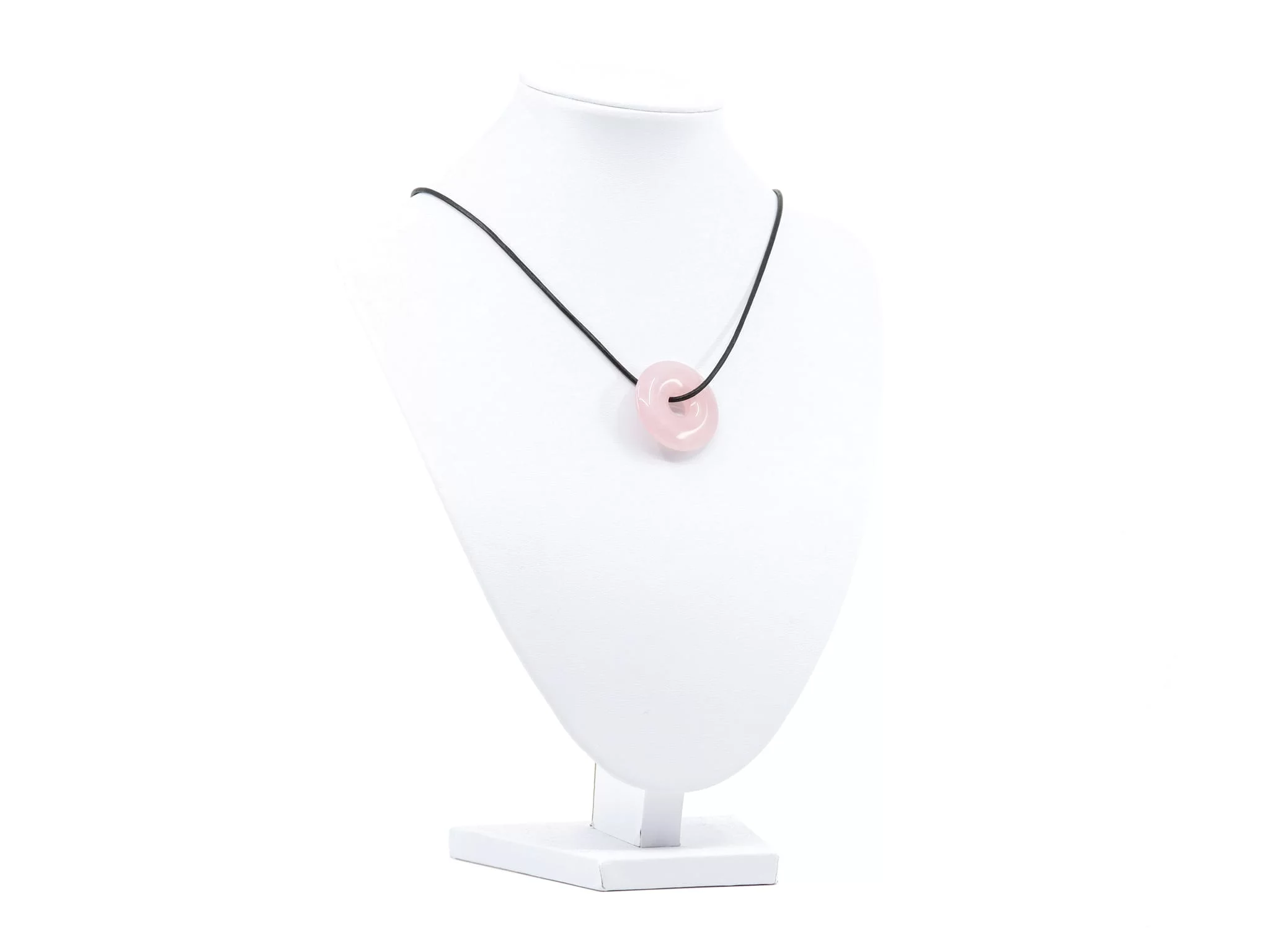 Rose quartz donut pendant shown as a necklace on a white jewelry bust