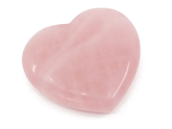 Rosenquarz Handschmeichler in Herzform als Nahansicht der sanft rosa polierten Oberfläche