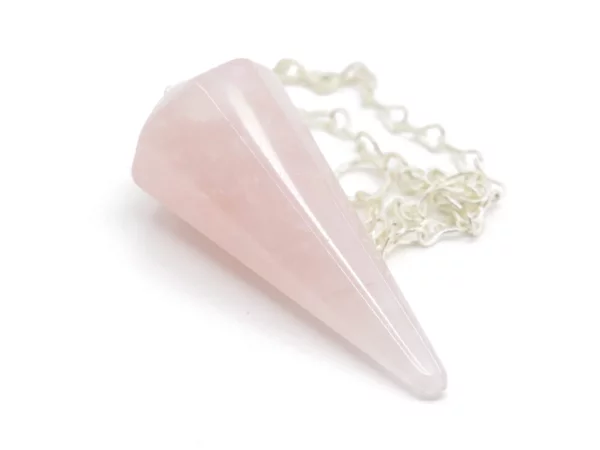 Rose quartz pendulum with silver-colored chain in close-up view on white background