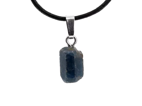 Sapphire natural crystal pendant with silver eyelet and black leather strap in front of a white background