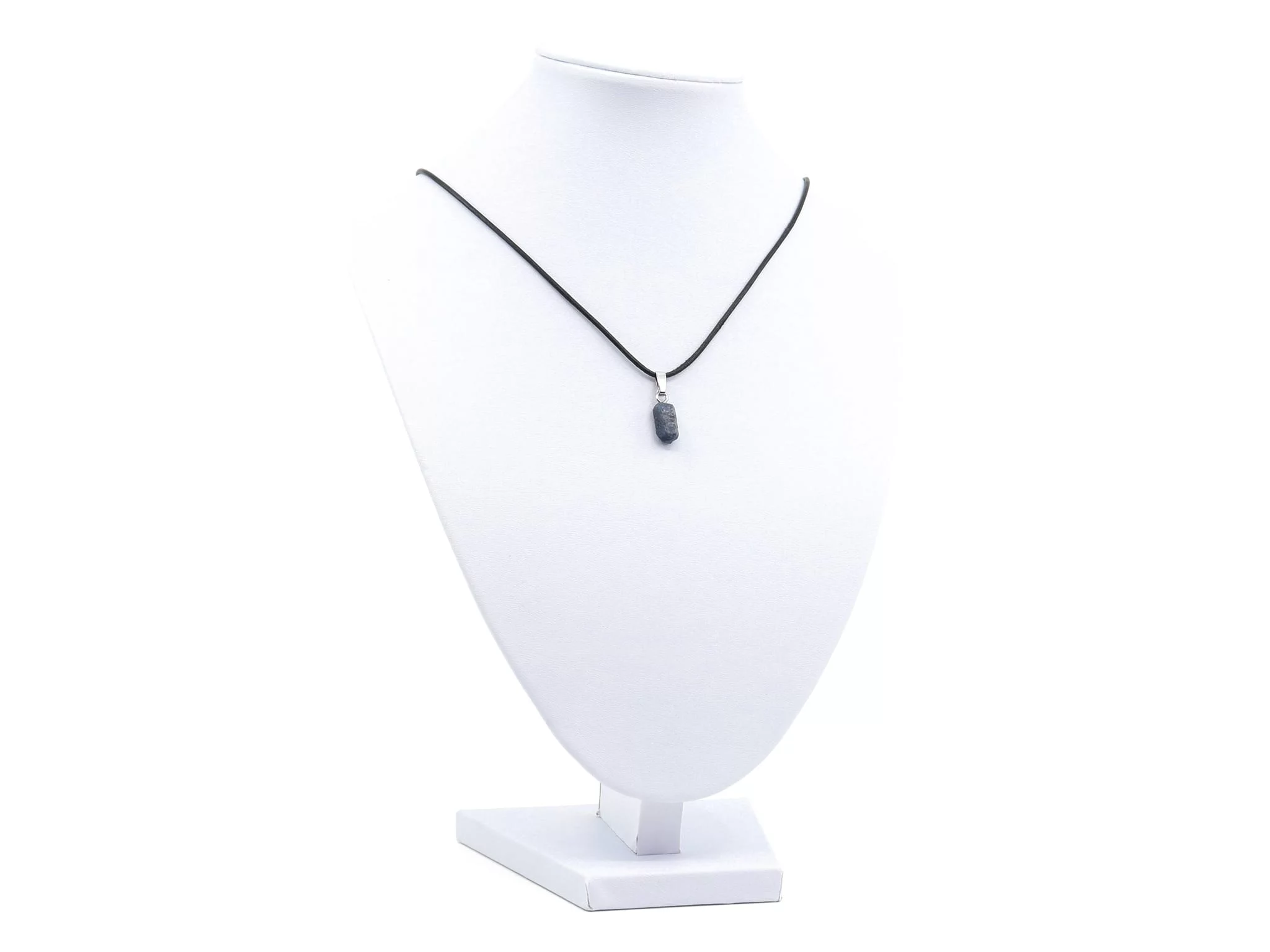 Sapphire natural crystal pendant as a necklace on a white jewelry bust stand