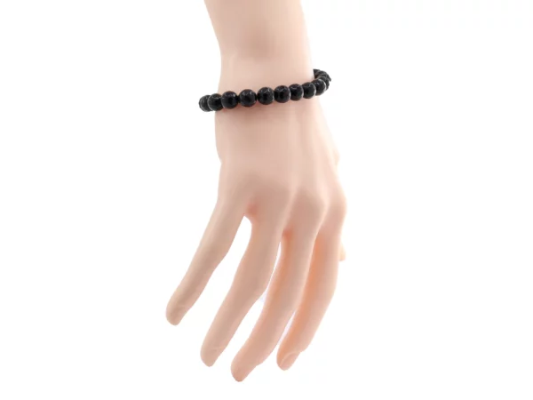Schörl Turmalin Armband mit schwarzen facettierten Kugeln als Trageansicht am Handgelenk