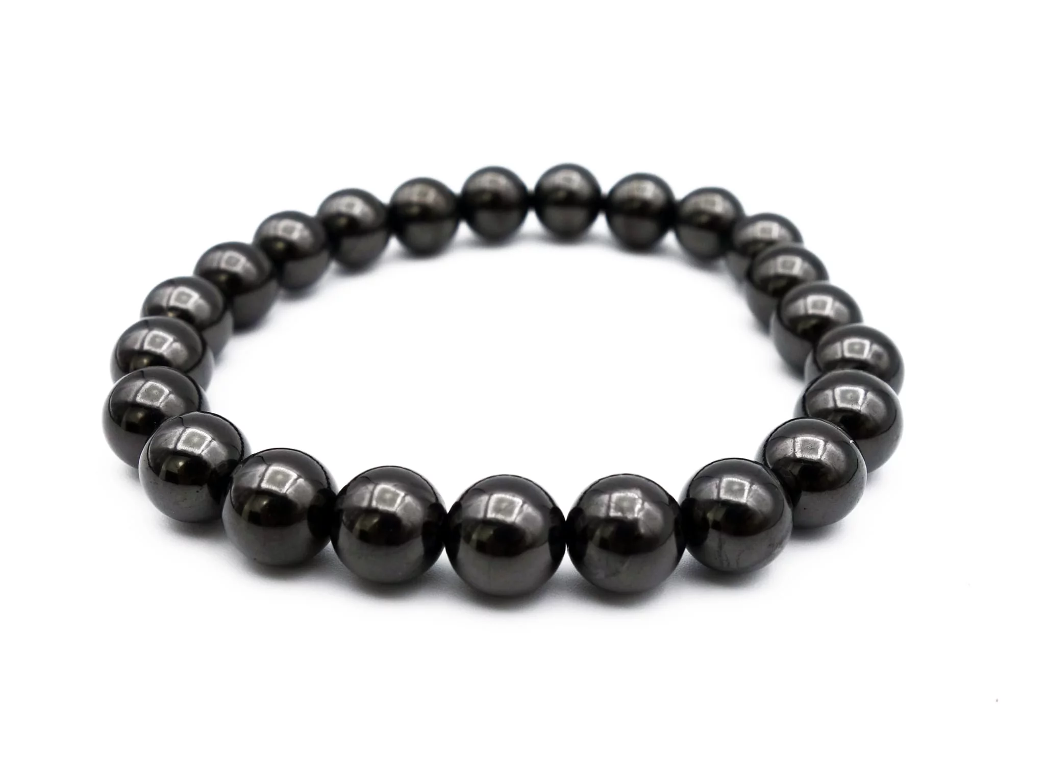 Shungite bracelet with glossy black 8 mm beads in a slightly raised side view