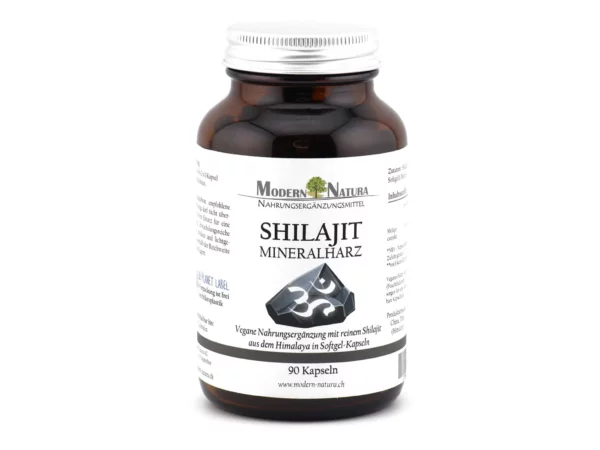Shilajit softgel capsules in a brown jar with a silver screw cap on a white background