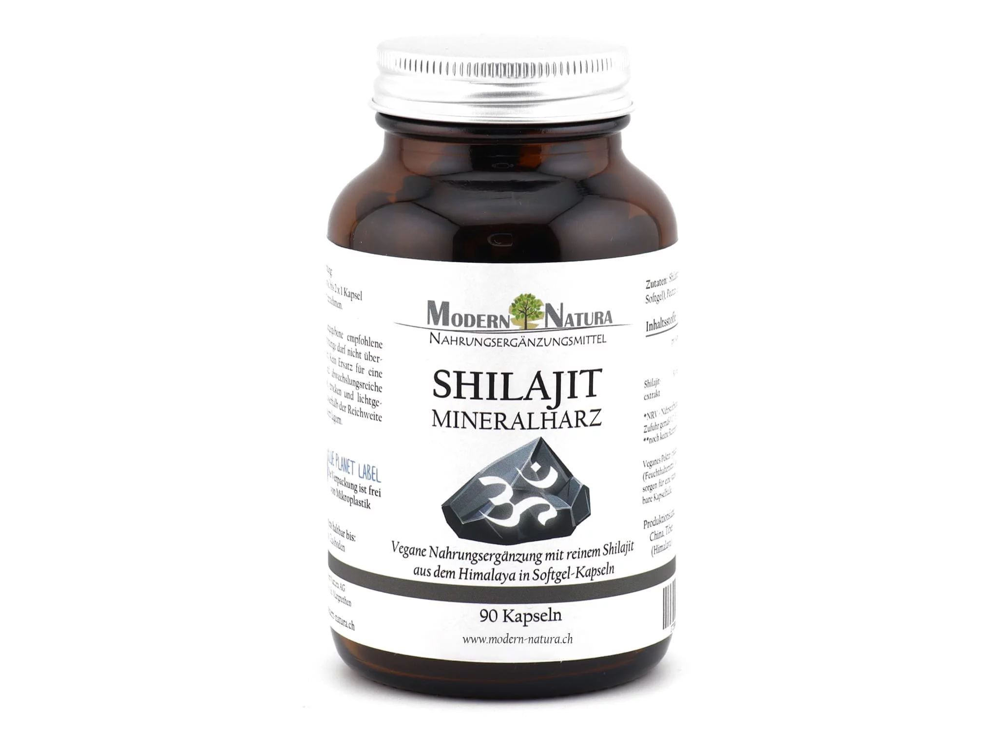 Shilajit softgel capsules in a brown jar with a silver screw cap on a white background