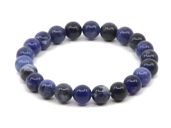 Bracciale in pietra preziosa sodalite con sfere lucide blu e blu-nero in vista dall'alto