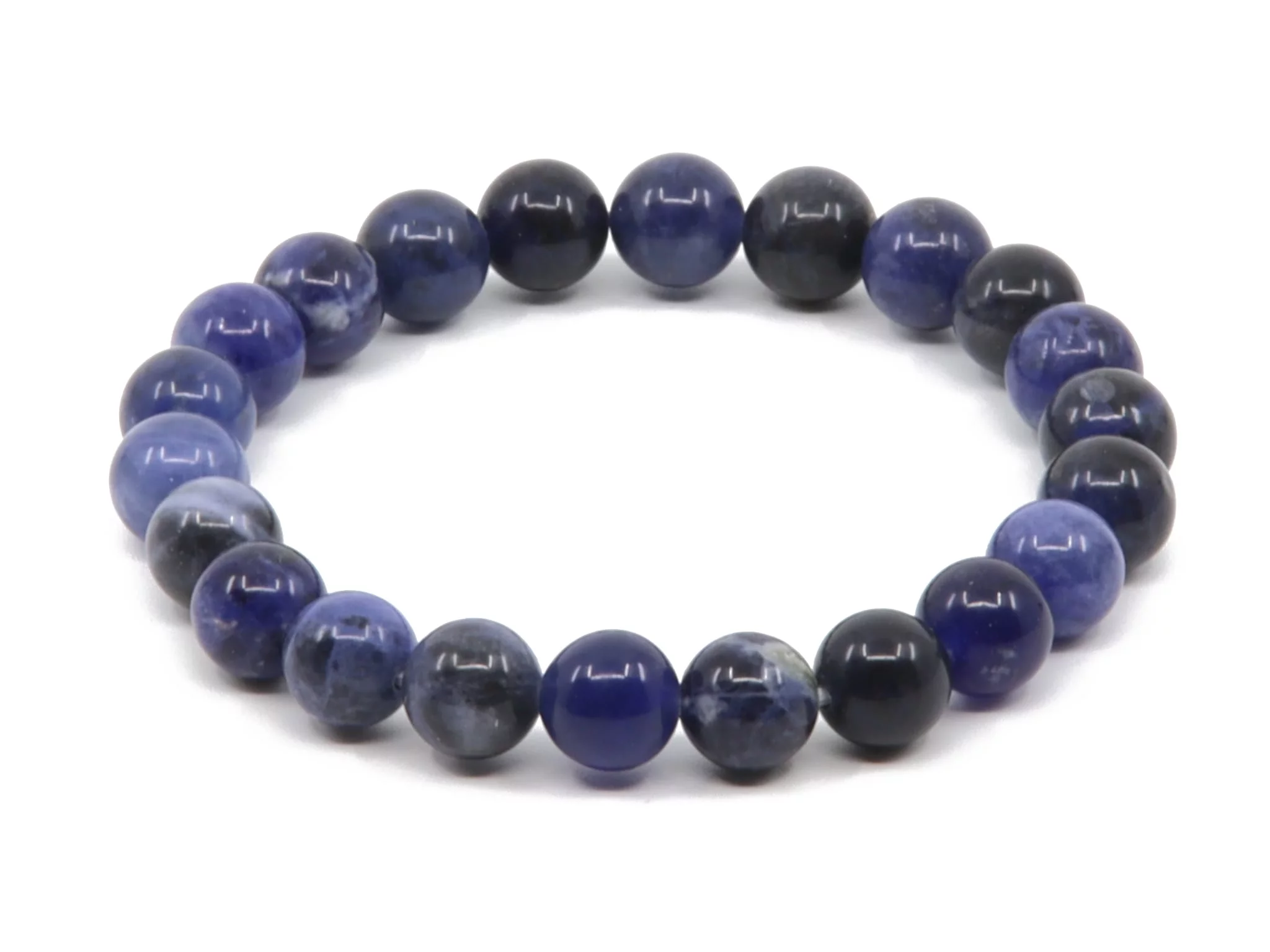 Bracciale in pietra preziosa sodalite con sfere lucide blu e blu-nero in vista dall'alto