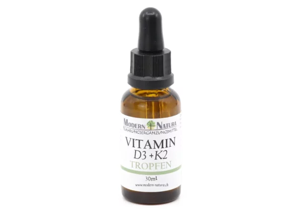 Vitamin D3 + K2 Drops in amber glass bottle with black pipette against white background