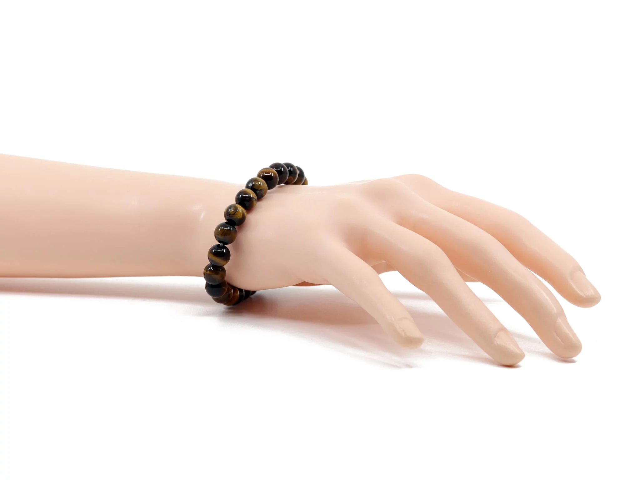Tigerauge Edelsteinarmband als Trageansicht am Handgelenk mit dunkelbraun-goldenen Kugeln
