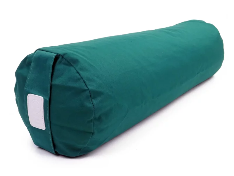 Bolster de yoga Clairière en vert avec forme ronde et boucle de transport sur fond blanc