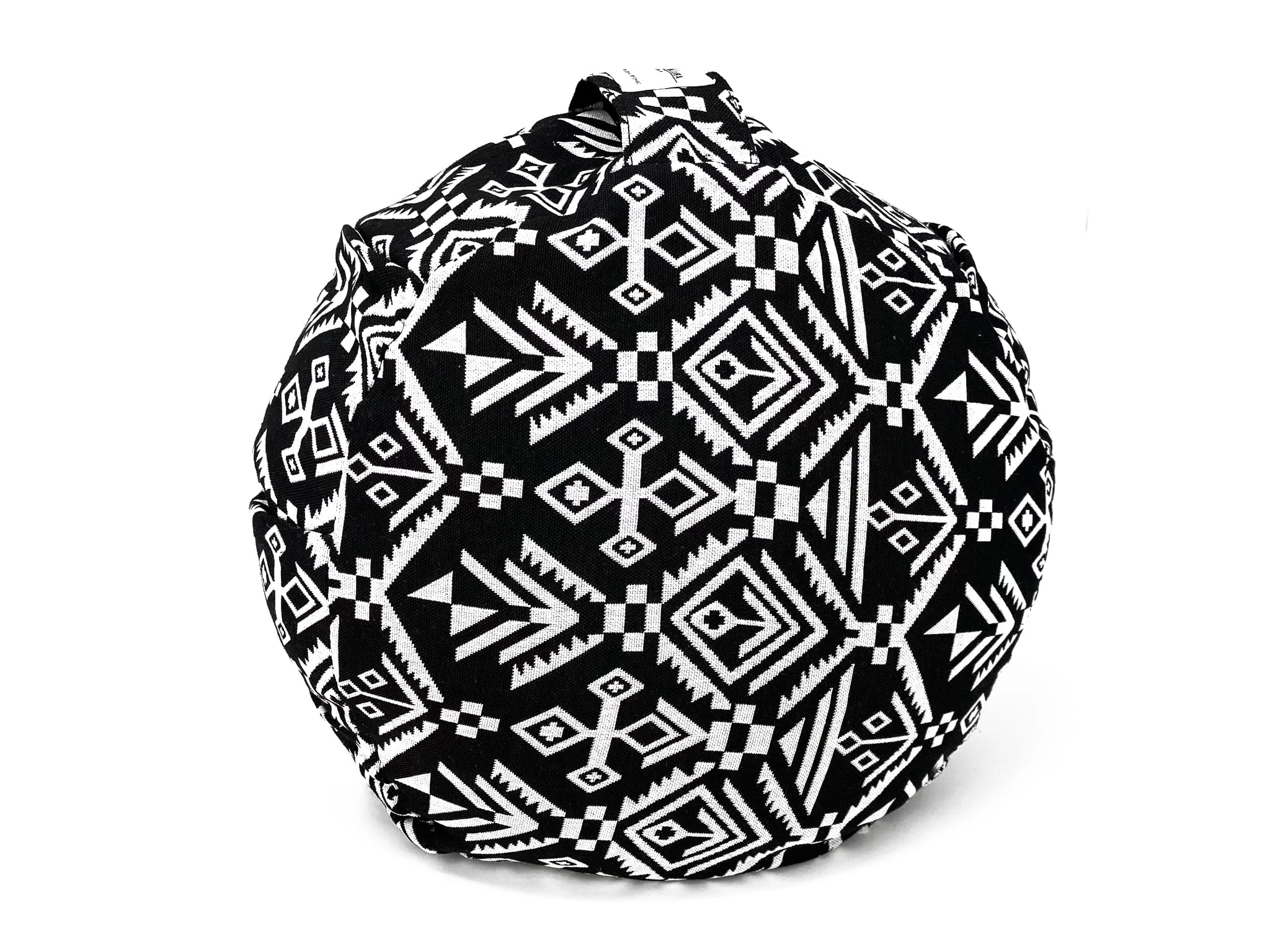 Cuscino yoga Zebra rotondo in vista dall'alto con motivo geometrico bianco e nero della fodera