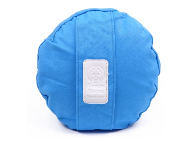 Yoga Bolster Azur with detail view of the round end, seams, and white brand label