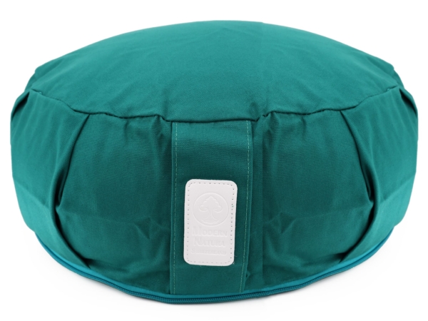 Coussin de yoga Clairière vert avec étiquette de marque visible et housse ronde rembourrée